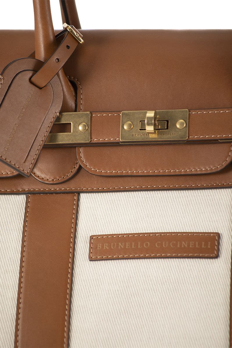 BRUNELLO CUCINELLI Elegant SS24 Milk Handbag for Travel with Leather and Fabric Textural Contrast