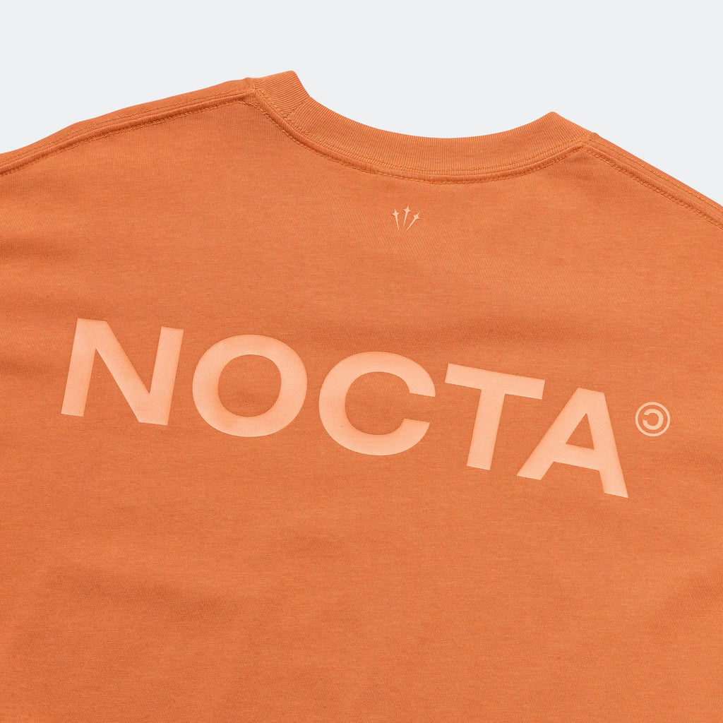 NOCTA CS SS Tee - Hot Curry/Orange Trance