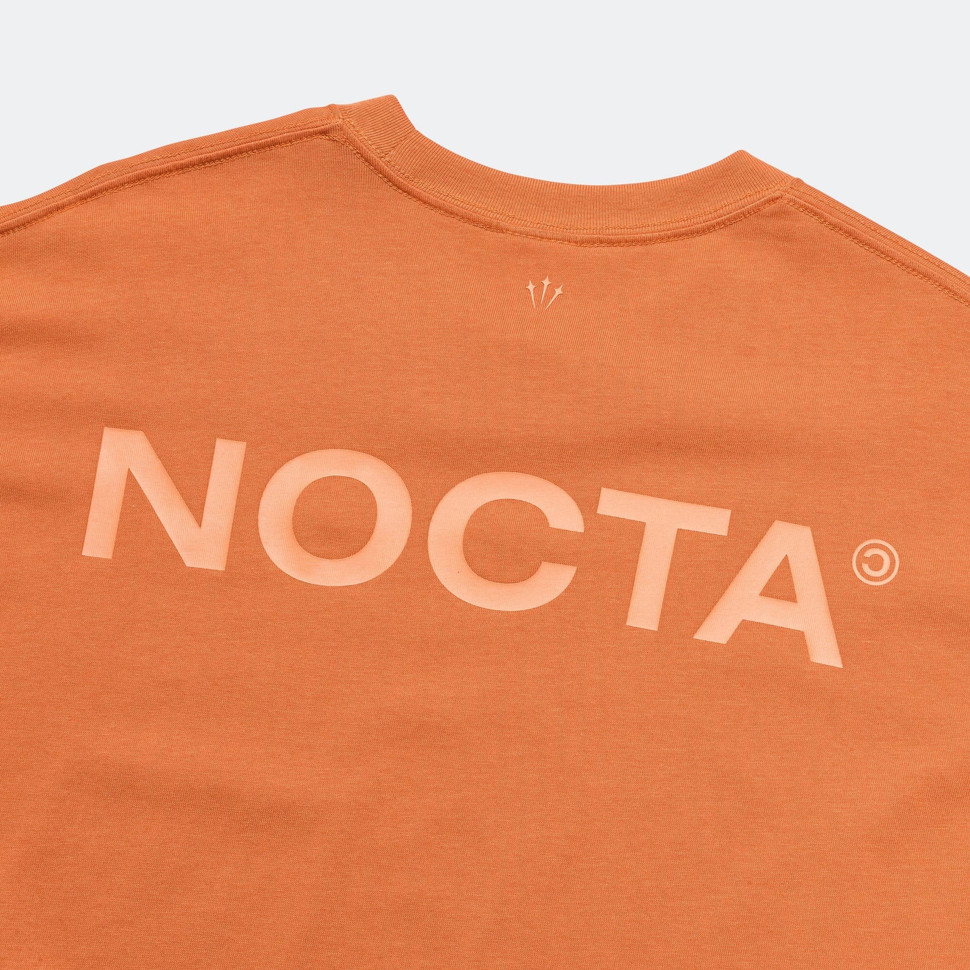 NOCTA CS SS Tee - Hot Curry/Orange Trance